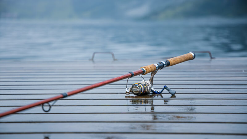 Fishing rod spinning blurred background